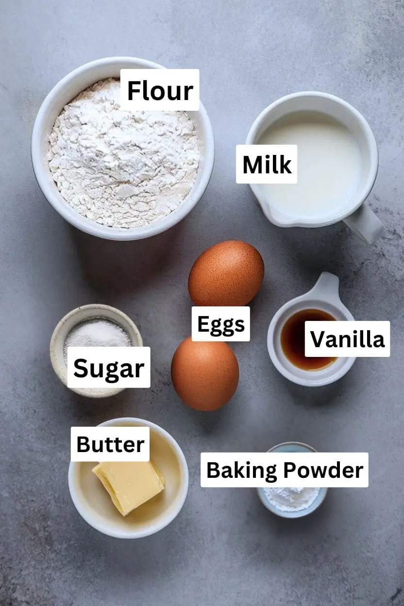 Ingredients for scrambled pancakes including flour, milk, eggs, sugar, butter, vanilla, and baking powder.