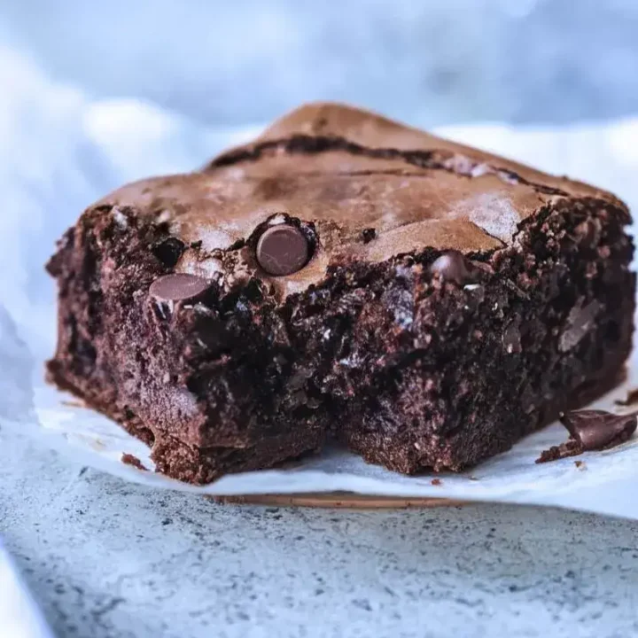 One piece of banana brownies with a bite taken out.